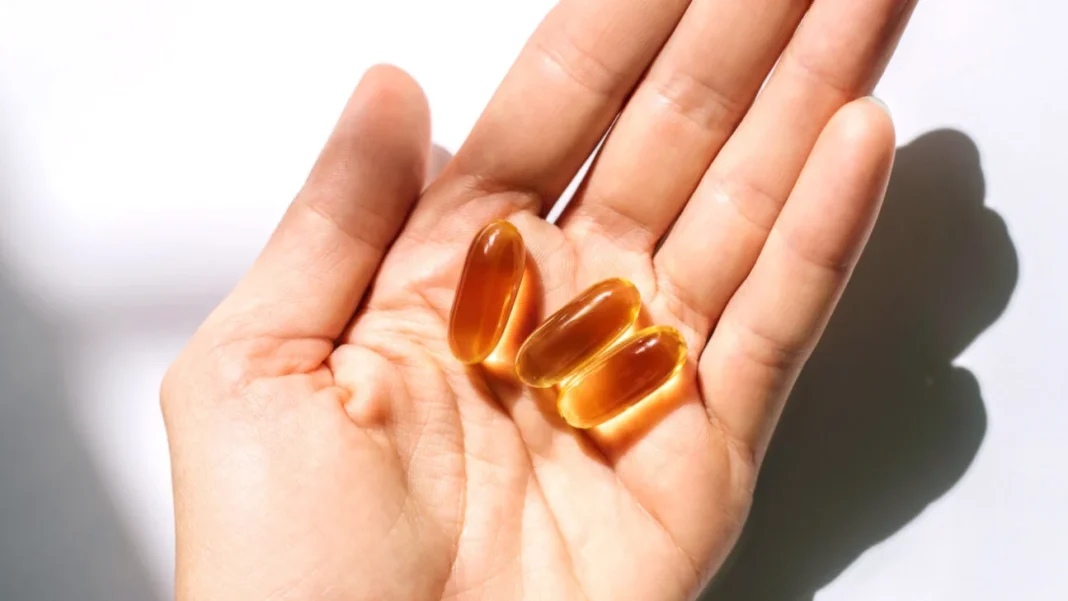 Fish oil capsules, a source of omega-3 fatty acids for heart and brain health.
